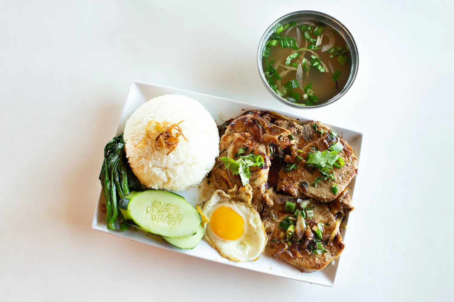 Grilled Pork Chop Plate with Rice, Egg, Vegetables, and Soup at Hanoi Chicken Noodle, Vietnamese Restaurant in San Leandro
